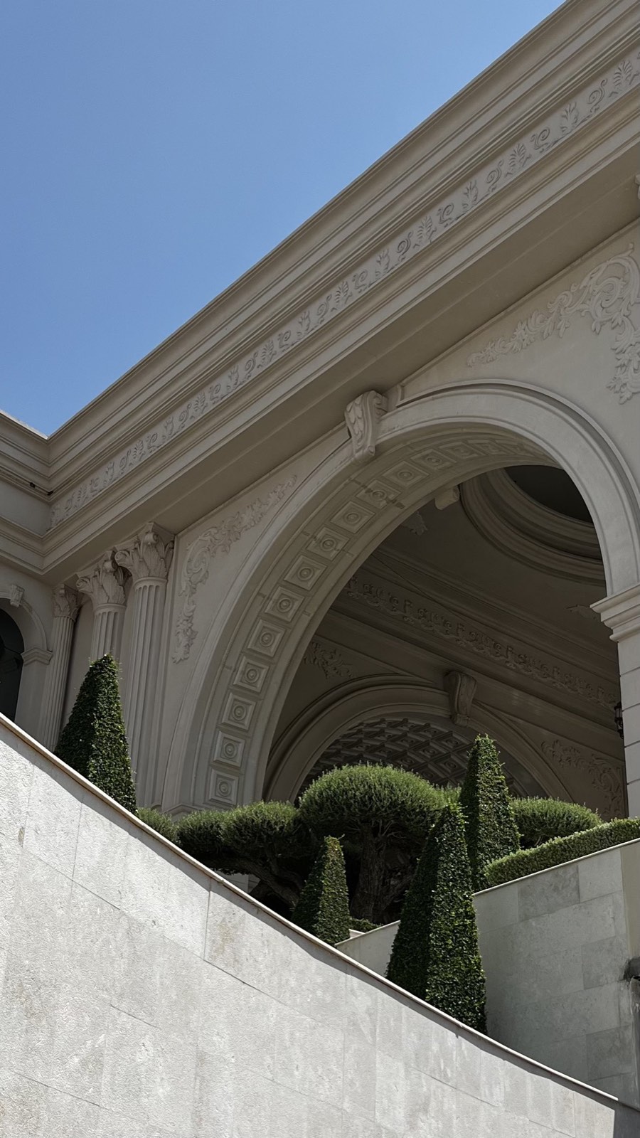 Architectural arches and sculpted garden